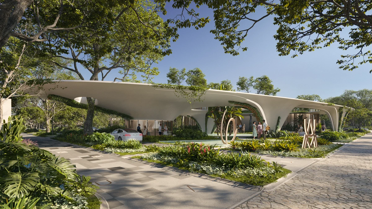 Open arrival pavilion integrated into the tropical landscape at Aldea Uh May