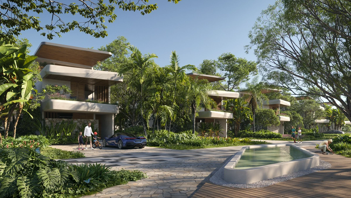 Garden residences and a landscaped water feature at Aldea Uh May
