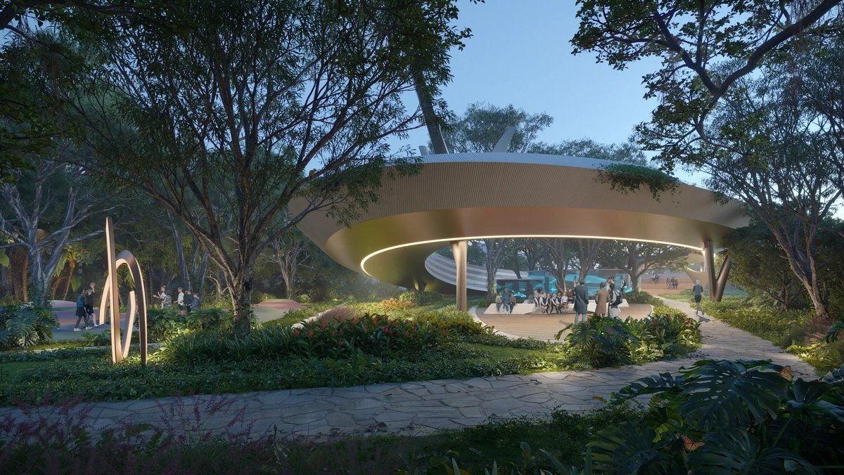 Illuminated circular pavilion surrounded by tropical gardens at Aldea Uh May