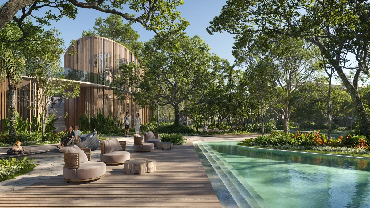 Pool terrace and timber pavilion surrounded by mature trees at Aldea Uh May